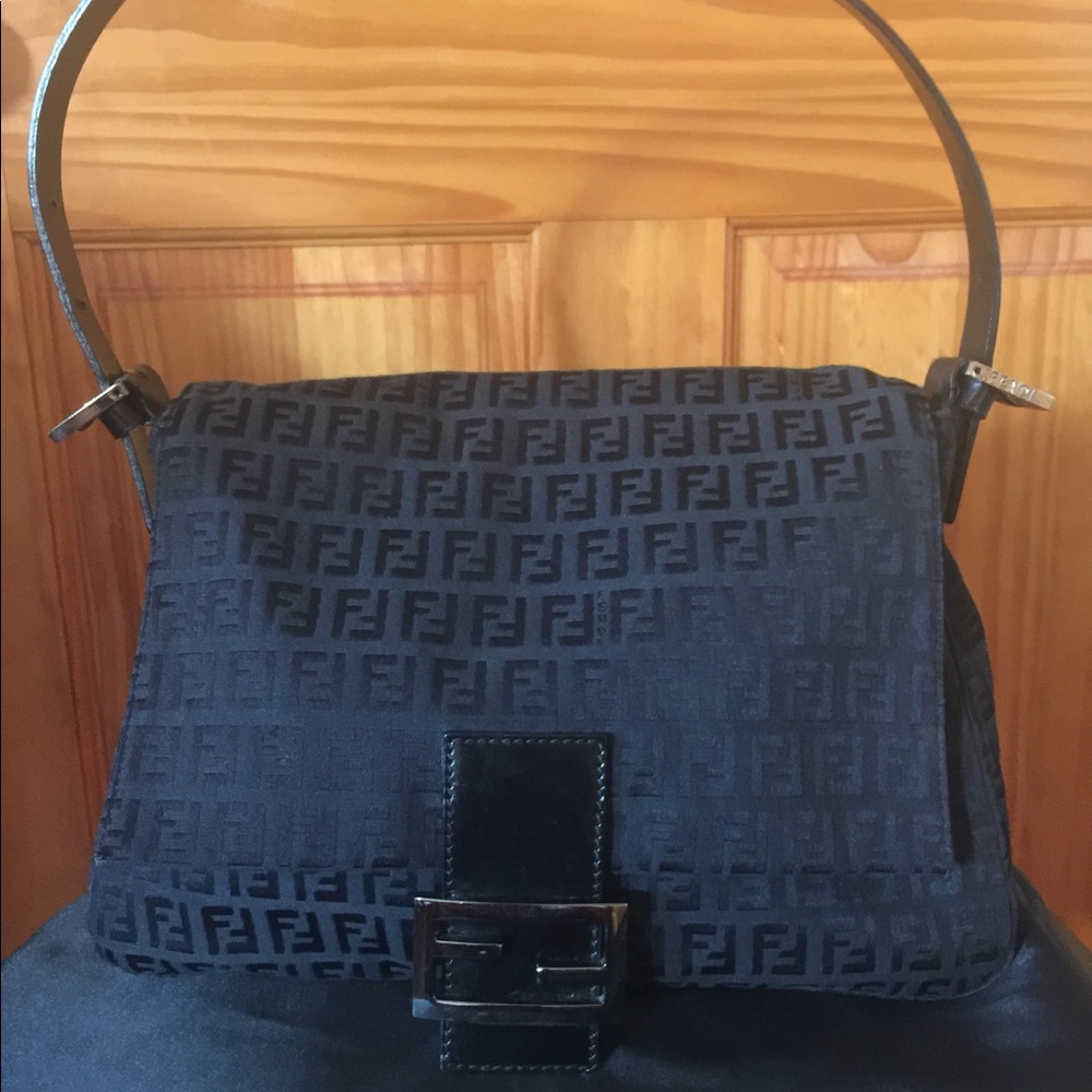 Authentic Fendi with leather strap